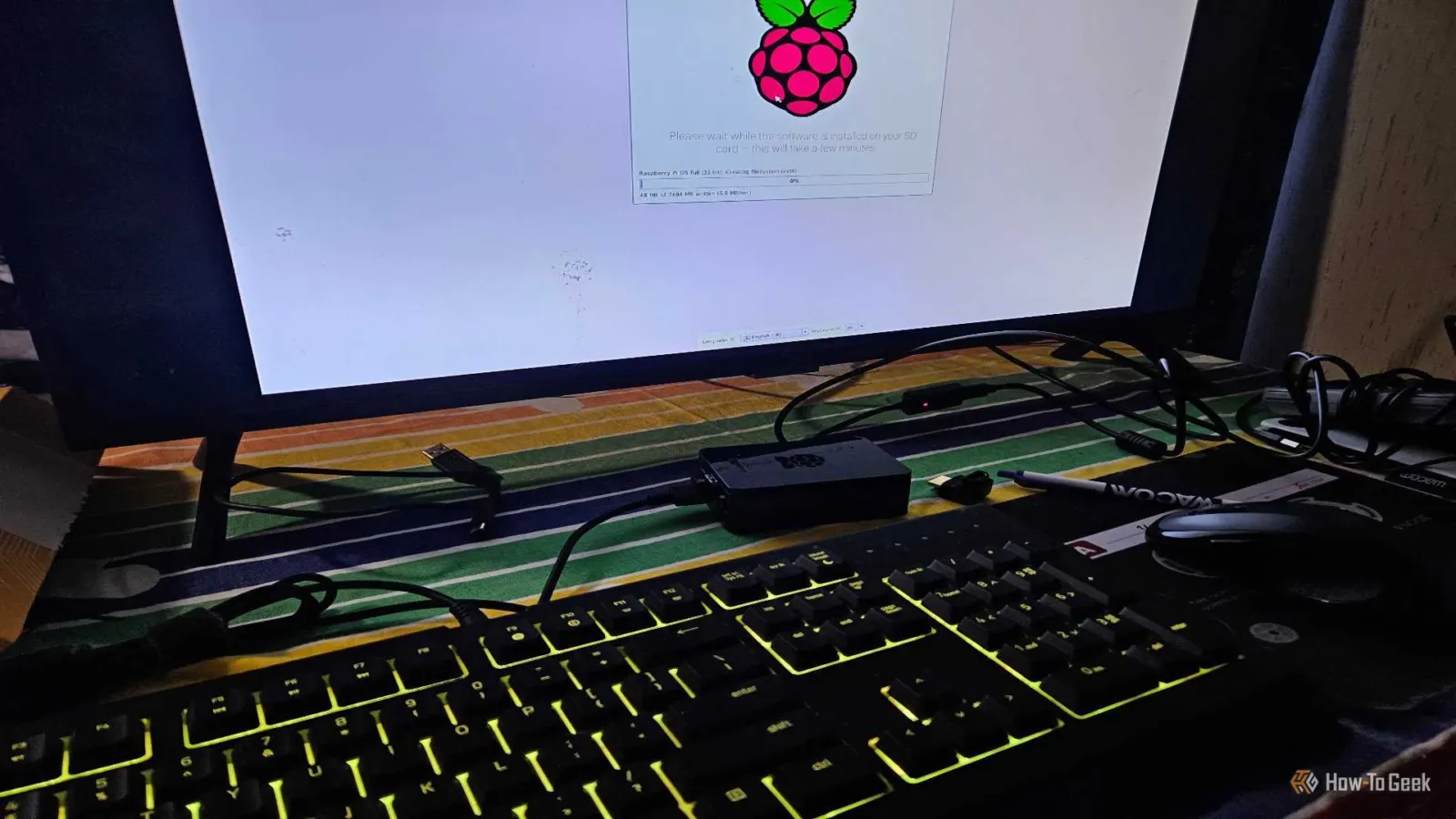 A Raspberry Pi Retro Setup with keyboard, mouse, and TV.